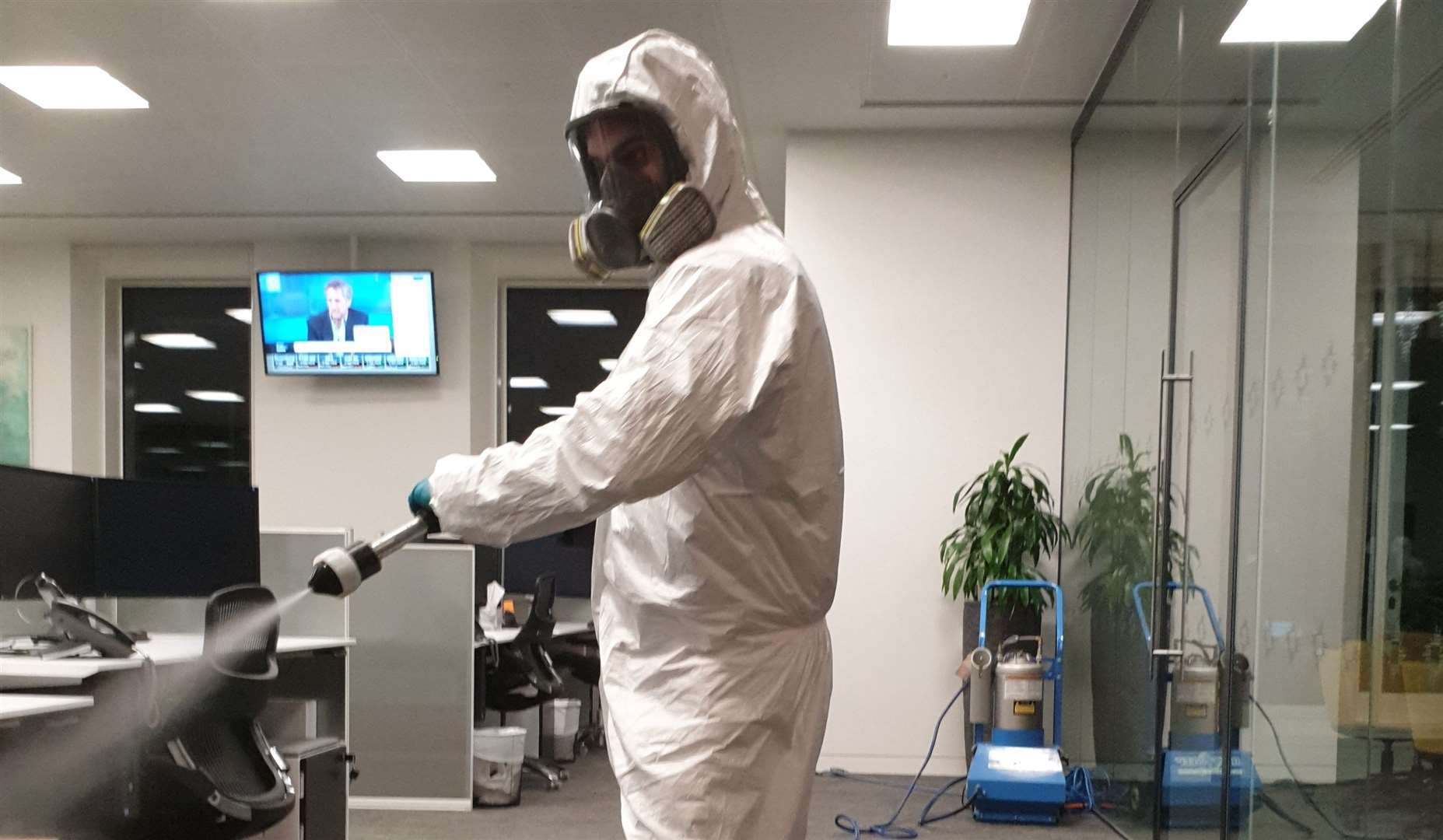 Adam Bourgeois wears protective clothing during cleaning. Credit: Ideal Response