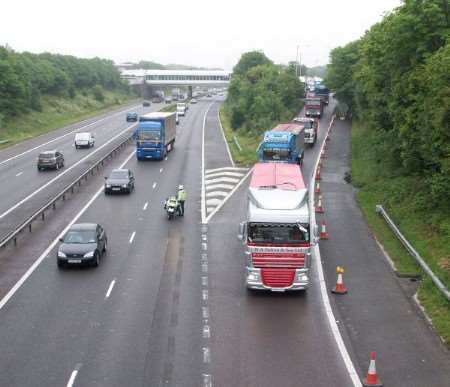 The lorry convoy leaves Farthing Corner Services.