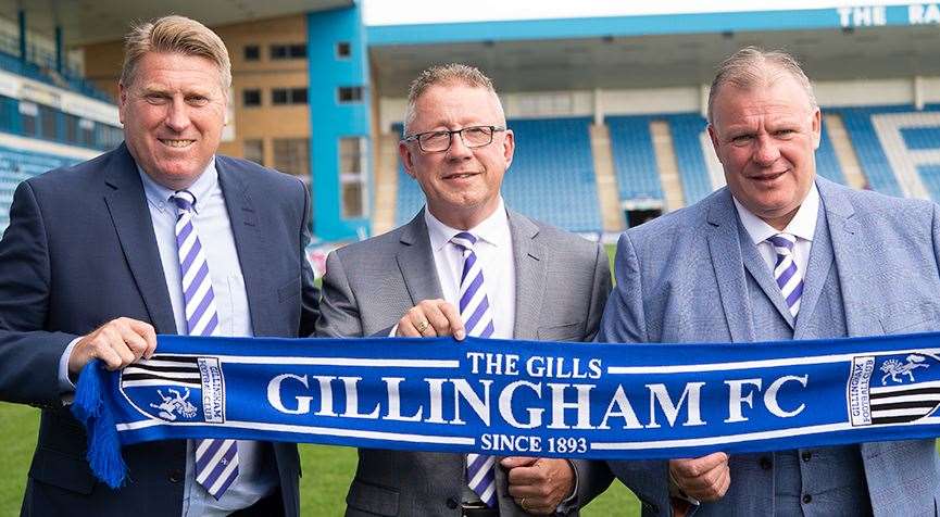 Gillingham assistant Paul Raynor, with chairman Paul Scally and new boss Steve Evans at Priestfield Picture: Ady Kerry (11048215)