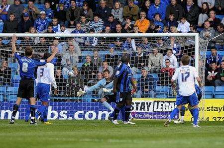 Cody McDonald (unsighted) heads Gillingham ahead against Burton Albion. Picture: Barry Goodwin.