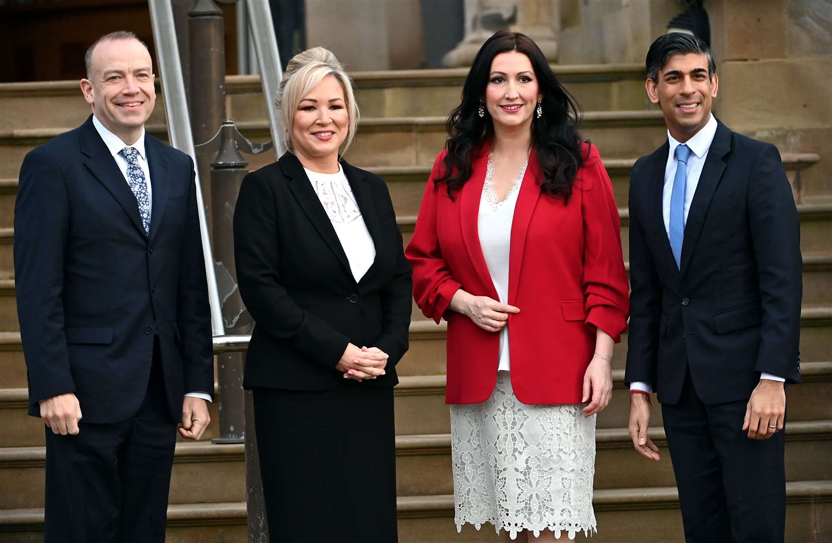 Northern Ireland Secretary Chris Heaton-Harris, First Minister Michelle O’Neill, deputy First Minister Emma Little-Pengelly and Prime Minister Rishi Sunak at Stormont Castle (Oliver McVeigh/PA)