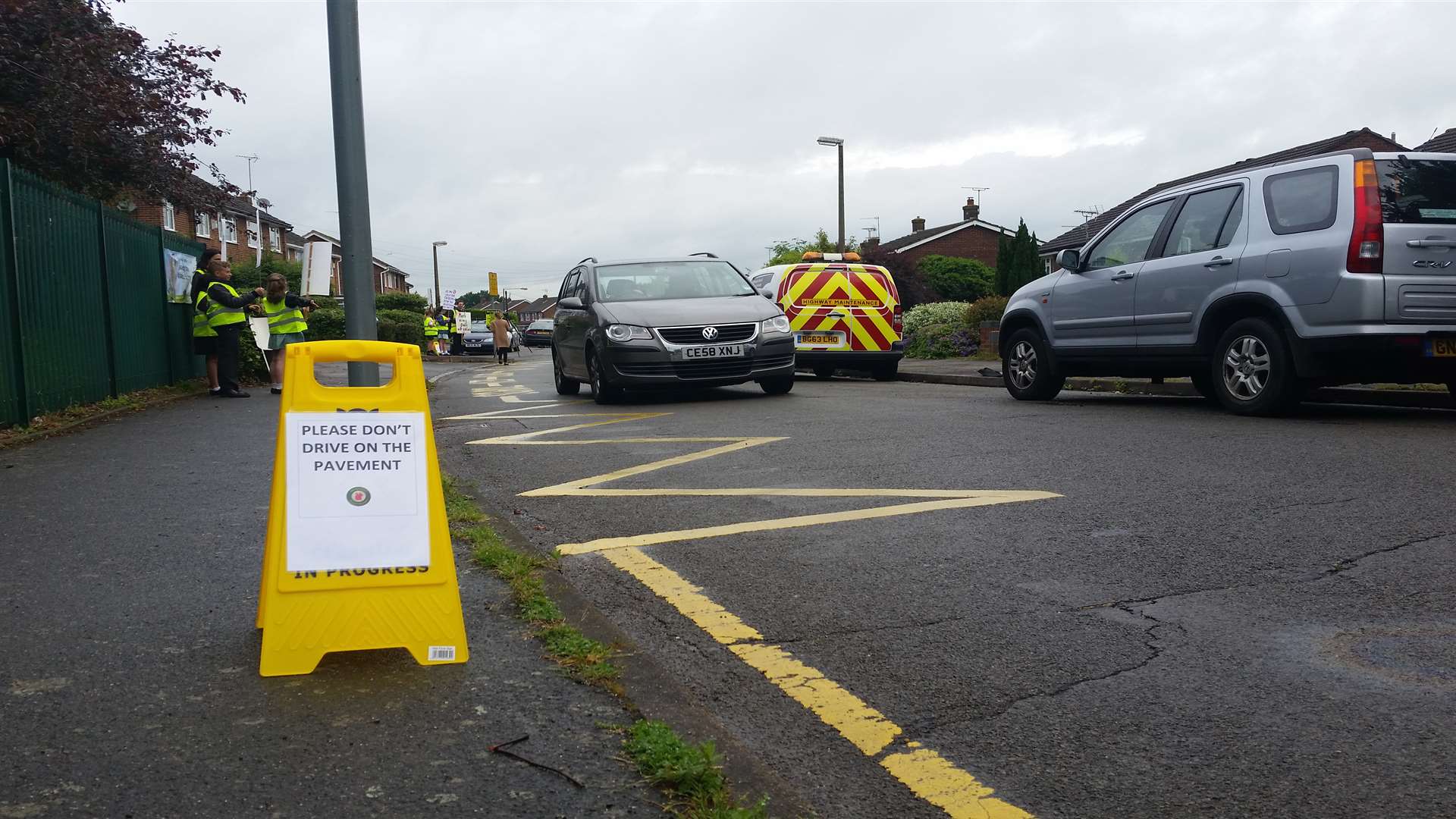 The pupils are campaigning to stop parents parking outside the school gates