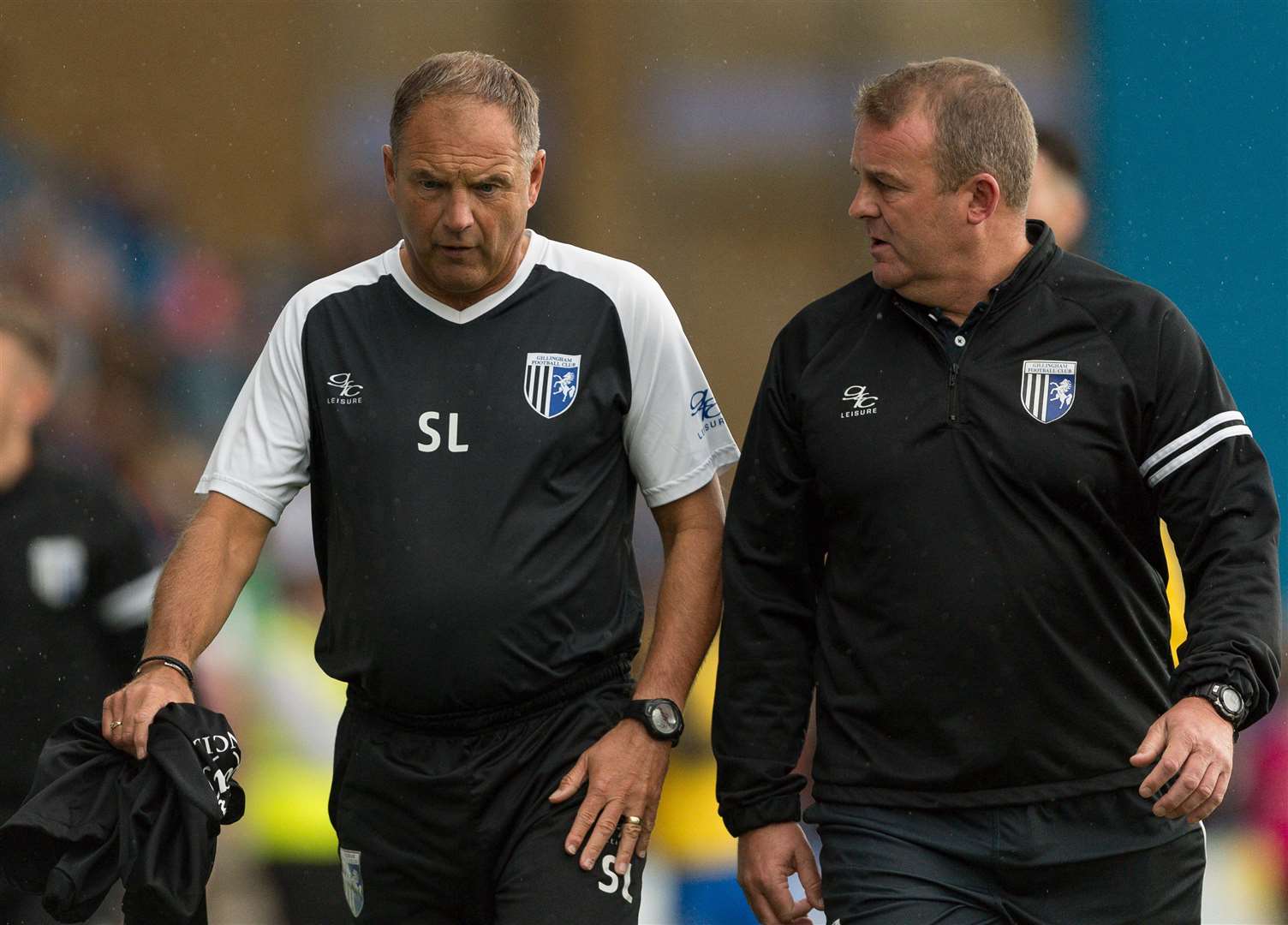 Gillingham manager Steve Lovell and Mark Patterson in conversation at the break Picture: Ady Kerry