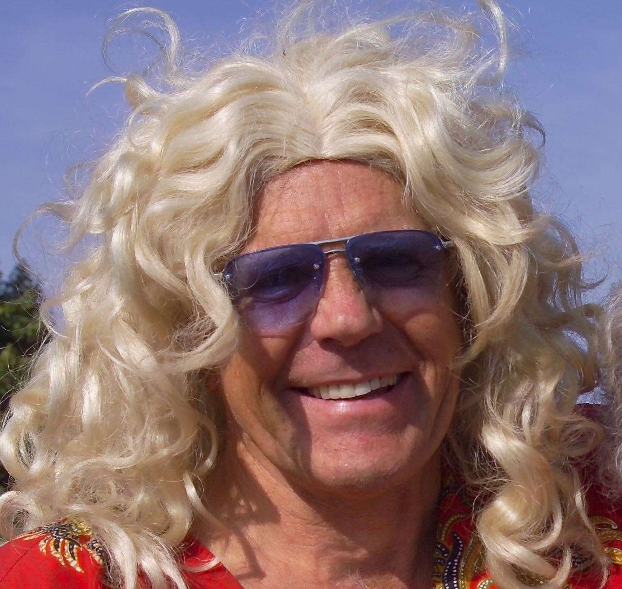 Adrian Ovenden dressed as Dolly Parton to take part in Farming World's annual Farming and Country Festival in 2003. He’s pictured with display steward Phyl Lawrence