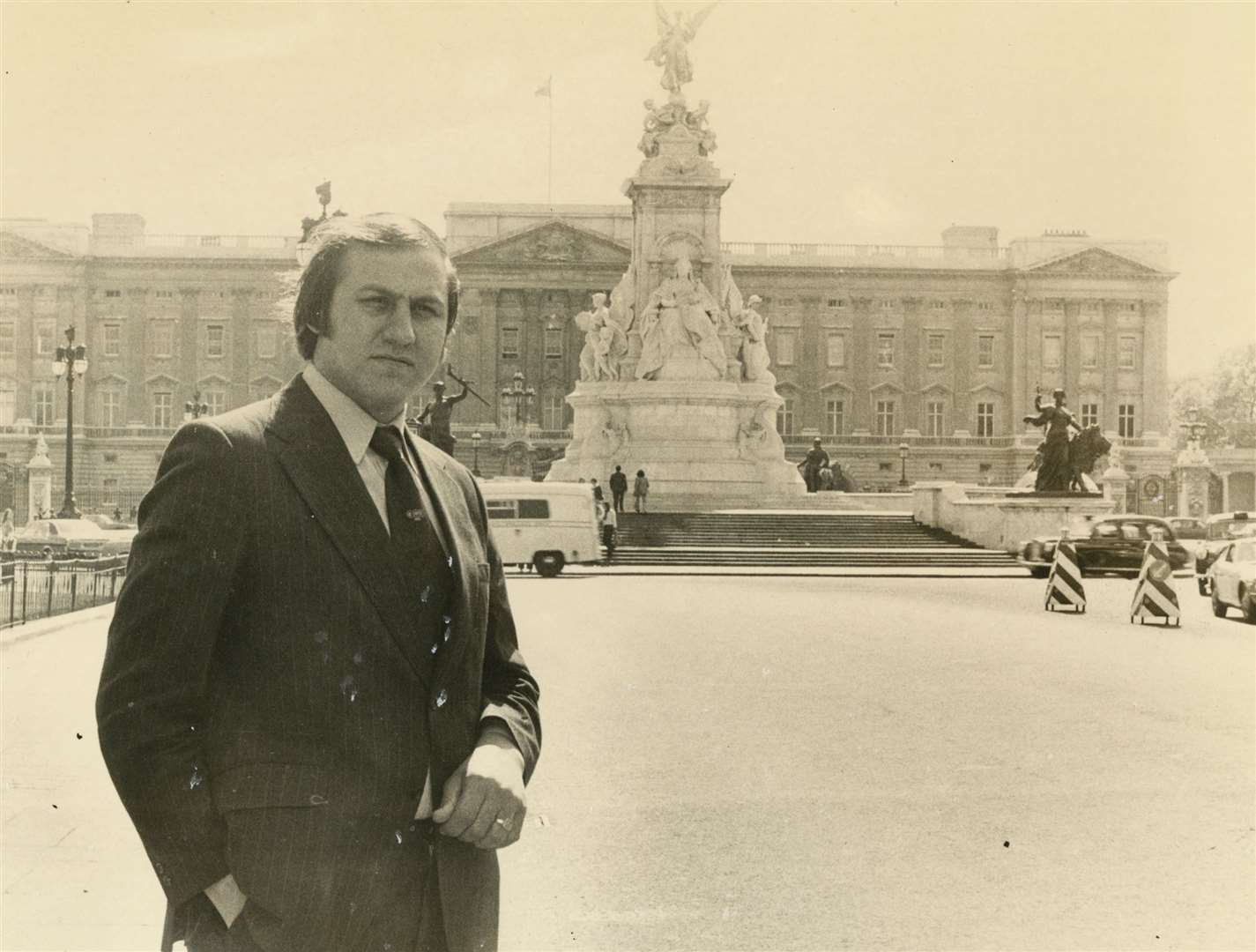 Mr Russell outside Buckingham Palace. Picture Dix Noonan Webb