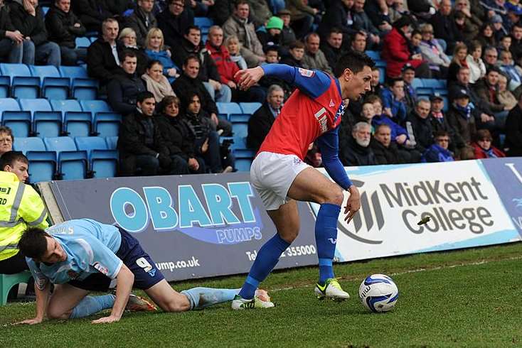 Joe Martin in action for Gillingham against Dagenham