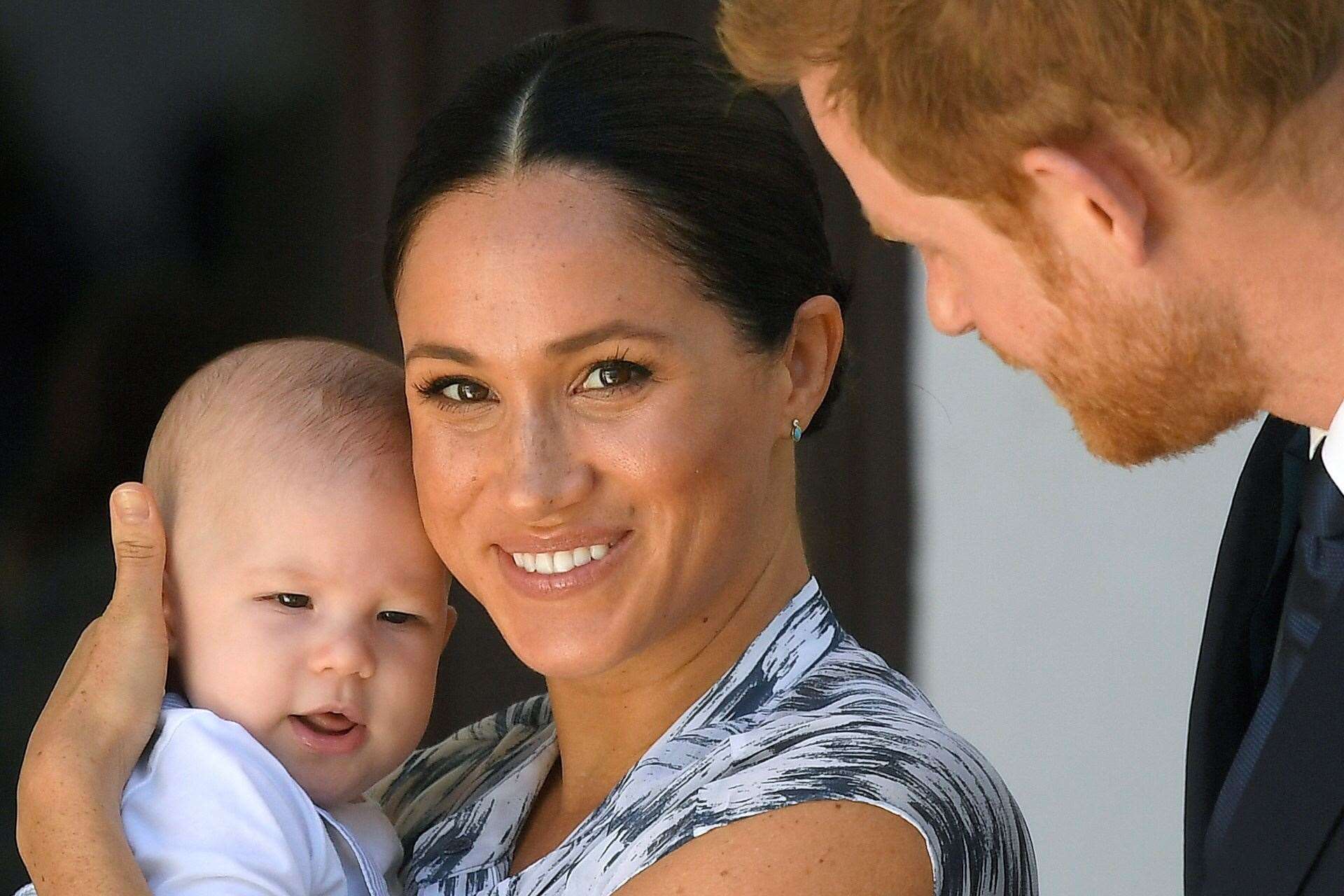 The Duke and Duchess of Sussex hold their son Archie (Toby Melville/PA)