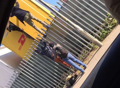 The men seen around the back of a lorry, Dover.