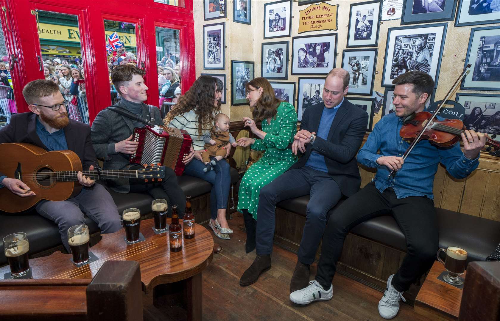 The Duke and Duchess of Cambridge meet local Galwegians during a visit to a traditional Irish pub in Galway city centre during the third day of their visit to the Republic of Ireland (Arthur Edwards/The Sun/PA)