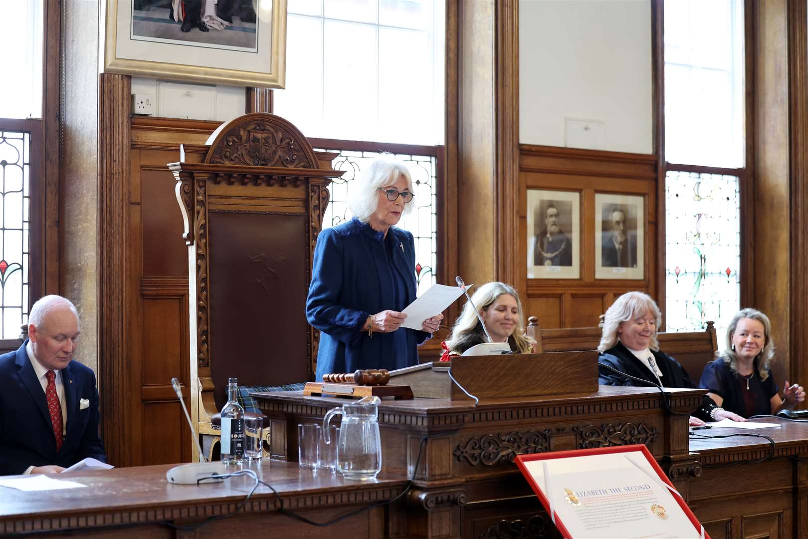 Queen Camilla delivers a speech on behalf of the King during a visit to Douglas Borough Council on the Isle of Man on March 20 2024 (Chris Jackson/PA)