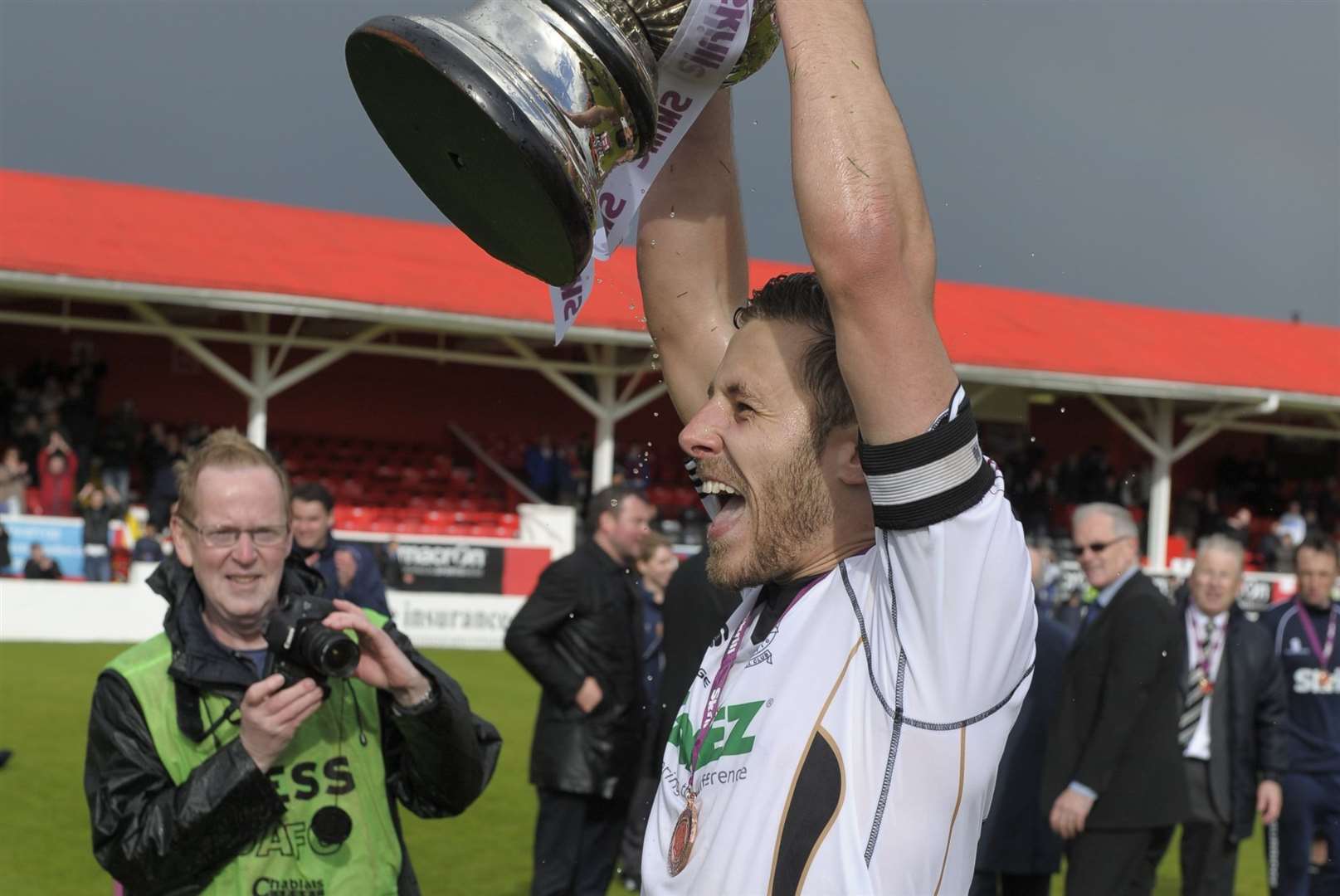 Craig Stone lifts the play-off trophy after captaining Dover against Ebbsfleet United Picture: Andy Payton