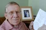 David Cole, from Headcorn, with the poem written by his wife, Norma.