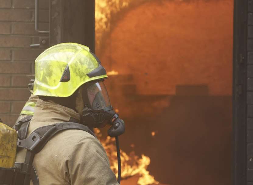 Firefighters wearing breathing apparatus tackled the blaze. Stock picture