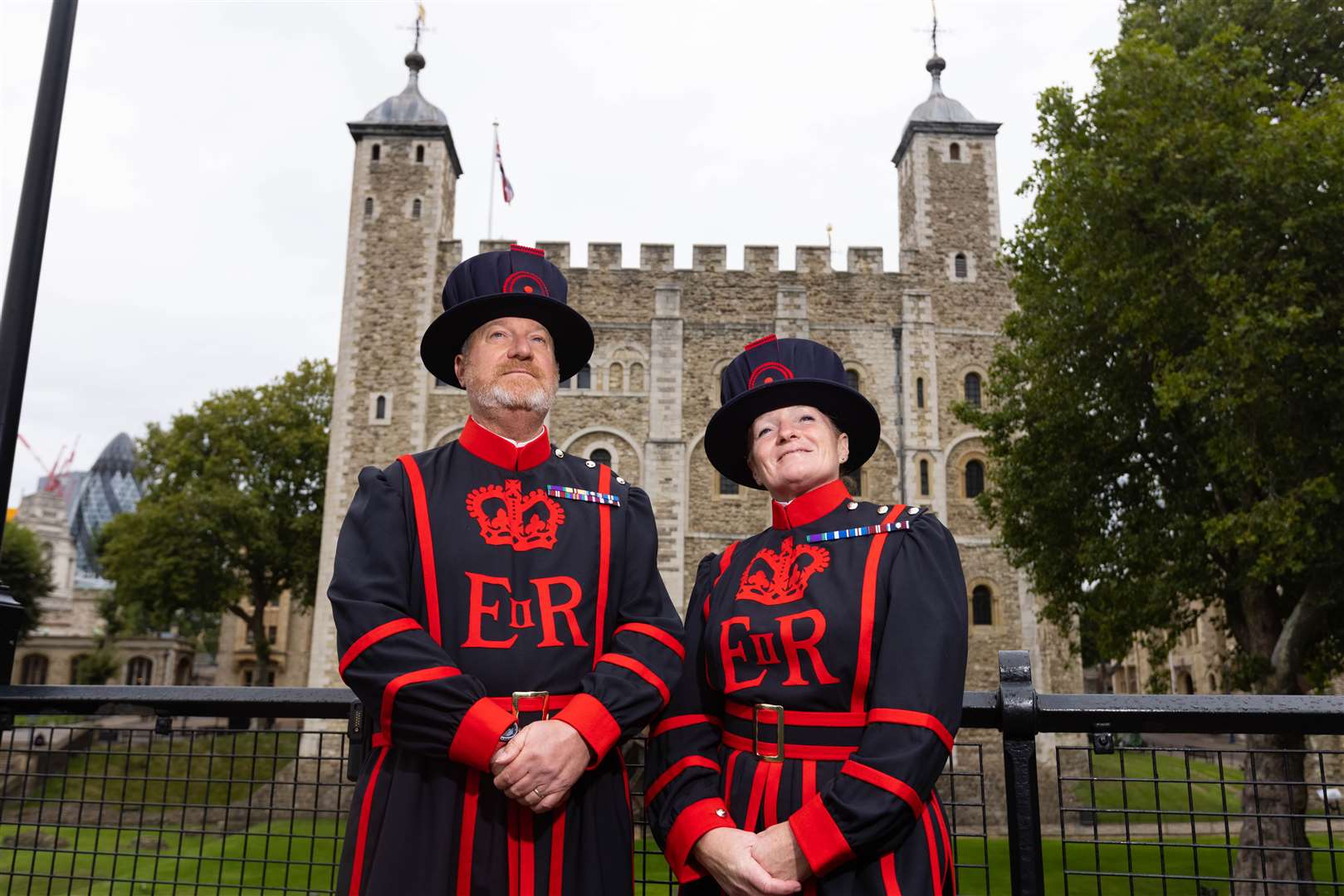 The previous uniforms with the late Queen’s EIIR cypher (David Parry/PA)