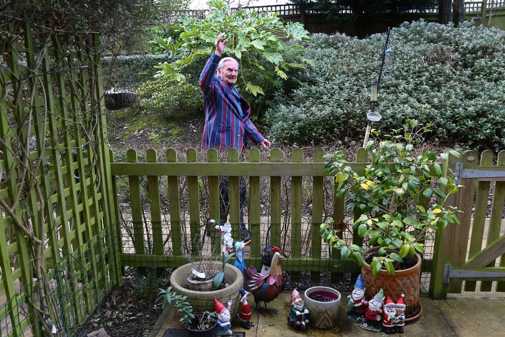 Tom Jones, 103, walks laps of the garden at his care home in Bexleyheath, Kent (Gareth Fuller/PA)