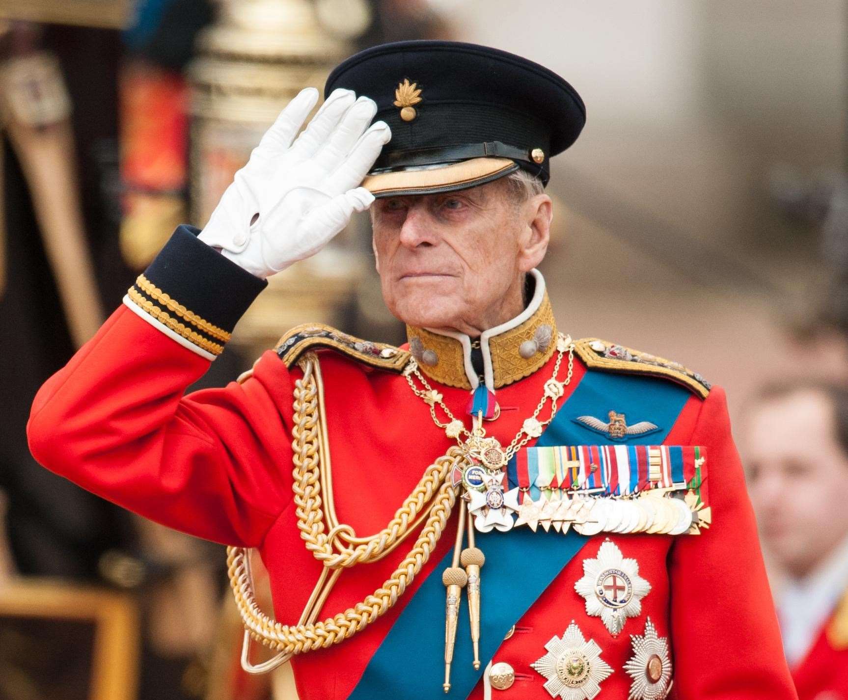 The duke inspects troops outside Buckingham Palace during the annual Trooping the Colour parade in 2012 (Dominic Lipinski/PA)