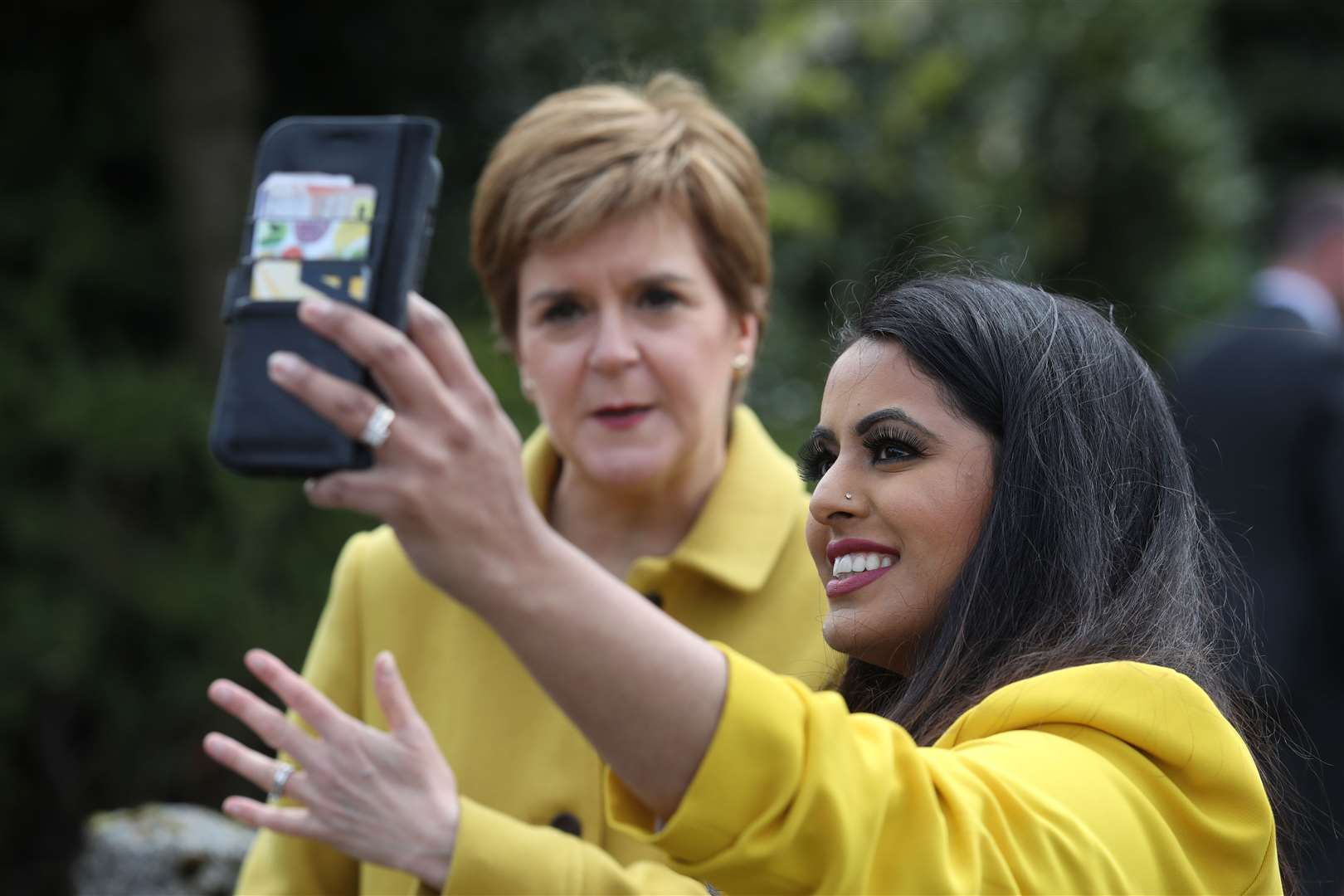 Anum Qaisar-Javed, pictured with First Minister Nicola Sturgeon, demanded real action to tackle racism (PA)