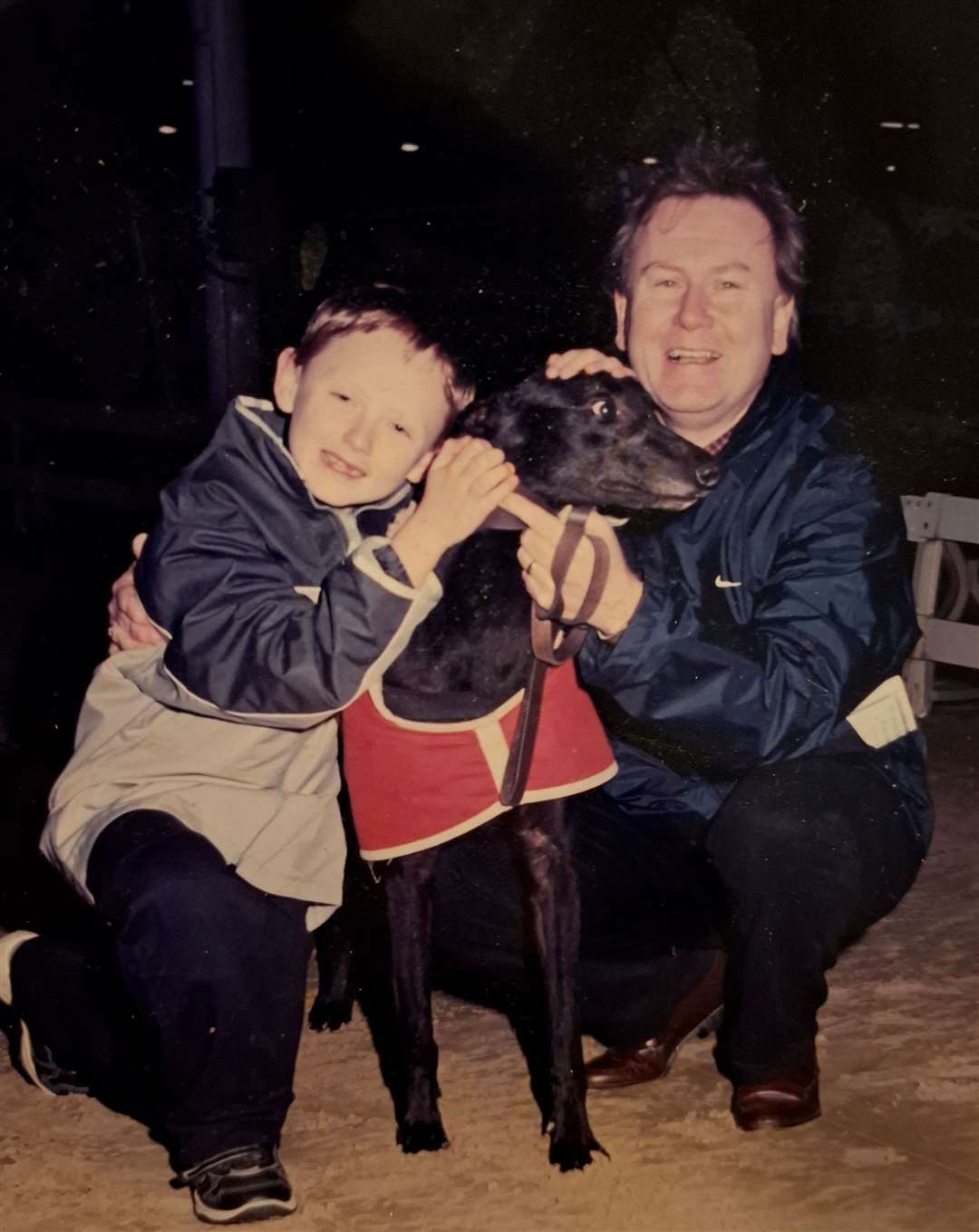 KentOnline's Sean Delaney as a boy with his dad Bill at the greyhound races