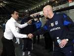 Mark Stimson shakes hands with his opposite number Roberto Martinez. Picture: MATTHEW WALKER