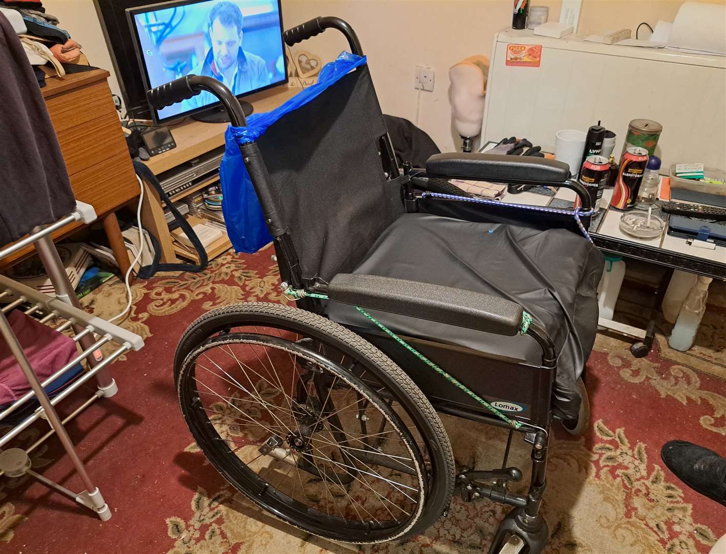 Mr Barnes says his wheelchair barely fits through the door of his flat