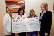 Ann Arthur presenting cheque to Barton Court