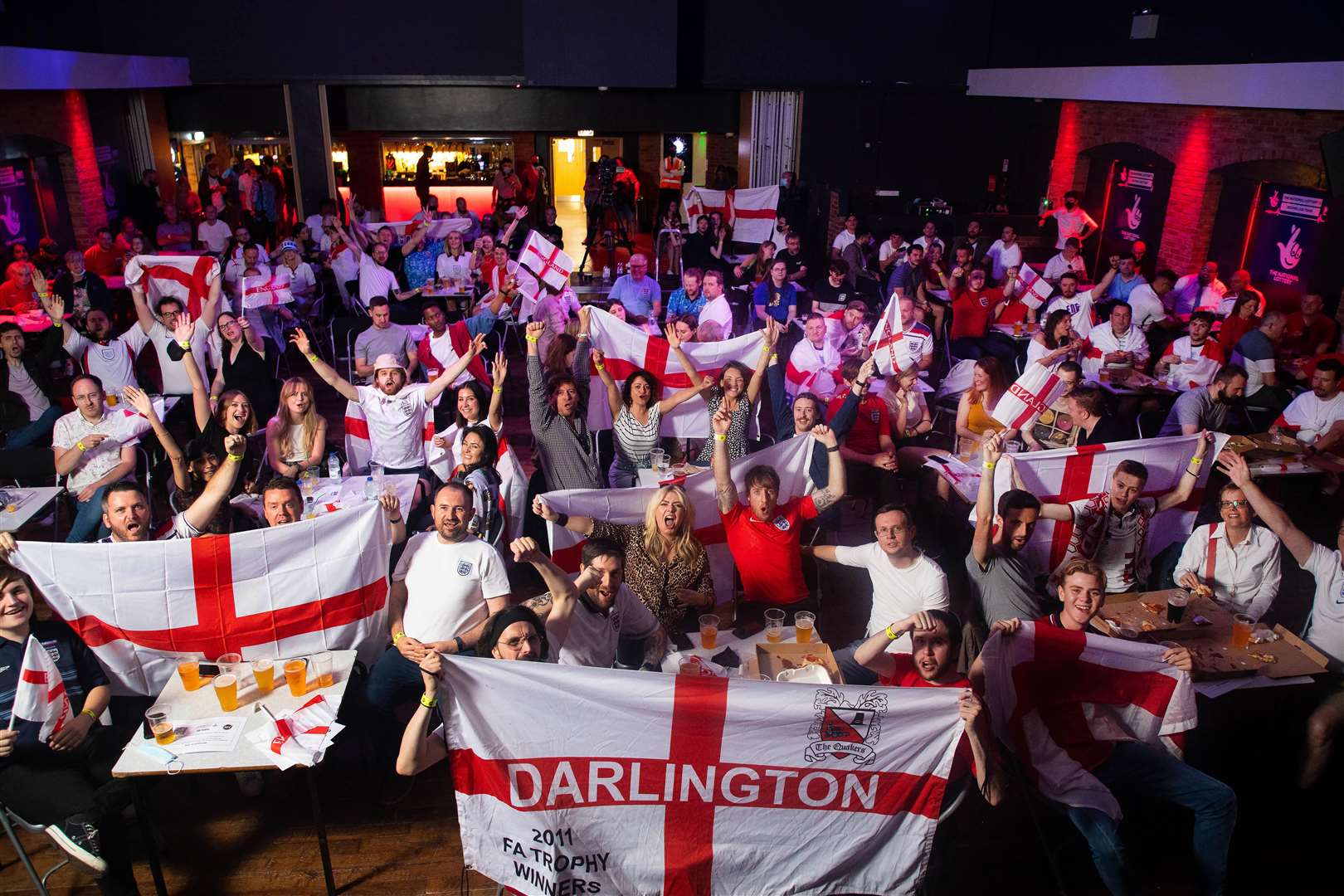 Fans wave St George’s flags (David Parry/PA)