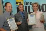 Kent Science Teachers of the Year Michael Lees and Christine Mullins receive their awards from Kevin Charles of Pfizer.