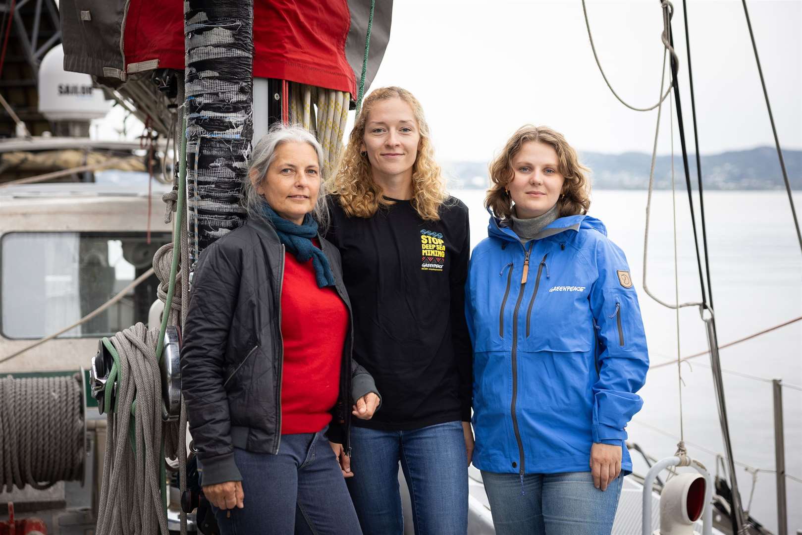 Dr Kirsten Young, Franziska Saalmann and Haldis Tjeldflaat Helle onboard the SY Witness (Daniel Muller/PA)