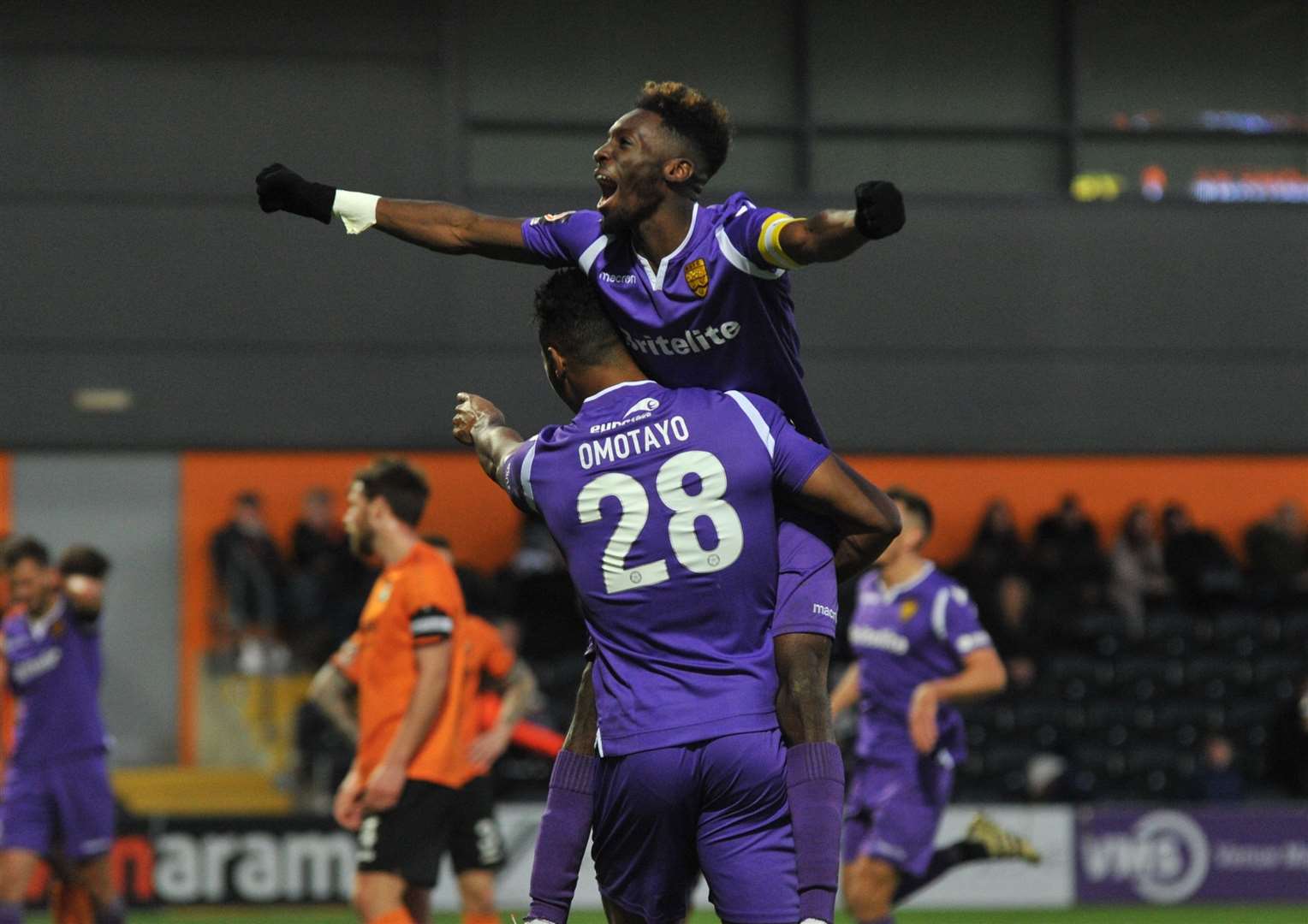 Gold Omotayo and Blair Turgott celebrate Maidstone's clincher against Barnet in November 2018 Picture: Steve Terrell