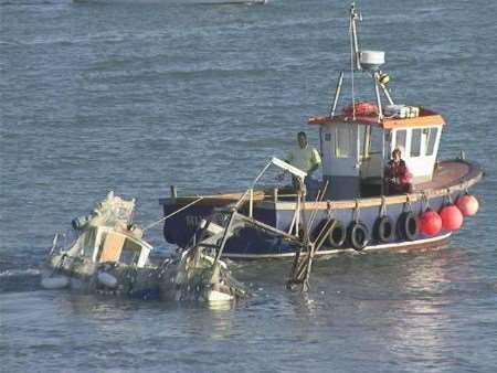 The stricken vessel is recovered. Picture: MIKE PETT