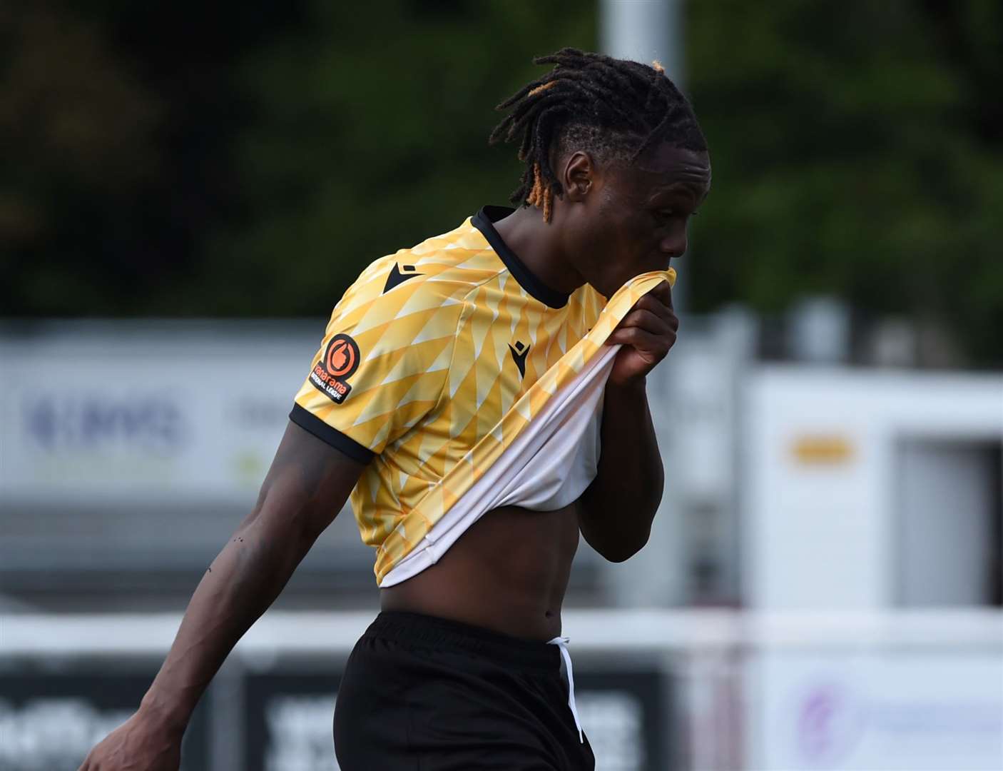 Razzaq Coleman De-Graft makes his way back to the dressing room following his red card against Taunton. Picture: Steve Terrell