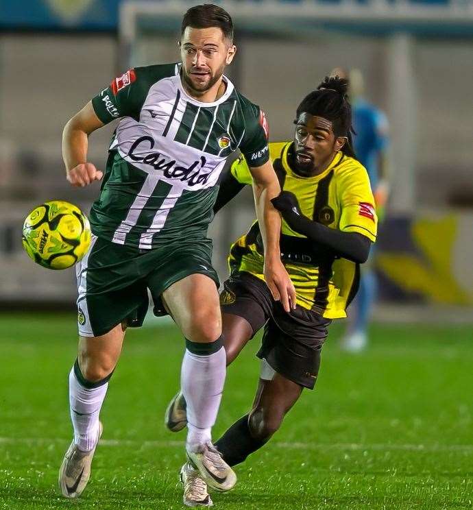 Mike West in action for Ashford against former club Herne Bay in Isthmian South East as he starts a loan spell away from Whitstable. Picture: Ian Scammell