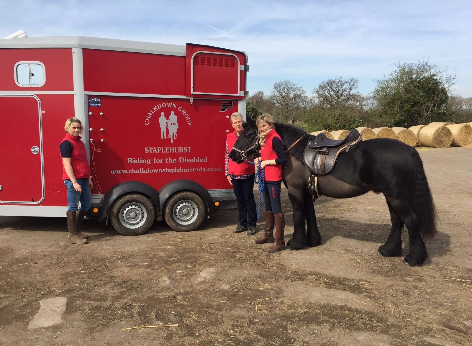 Volunteers with the trailer shortly after it was purchased