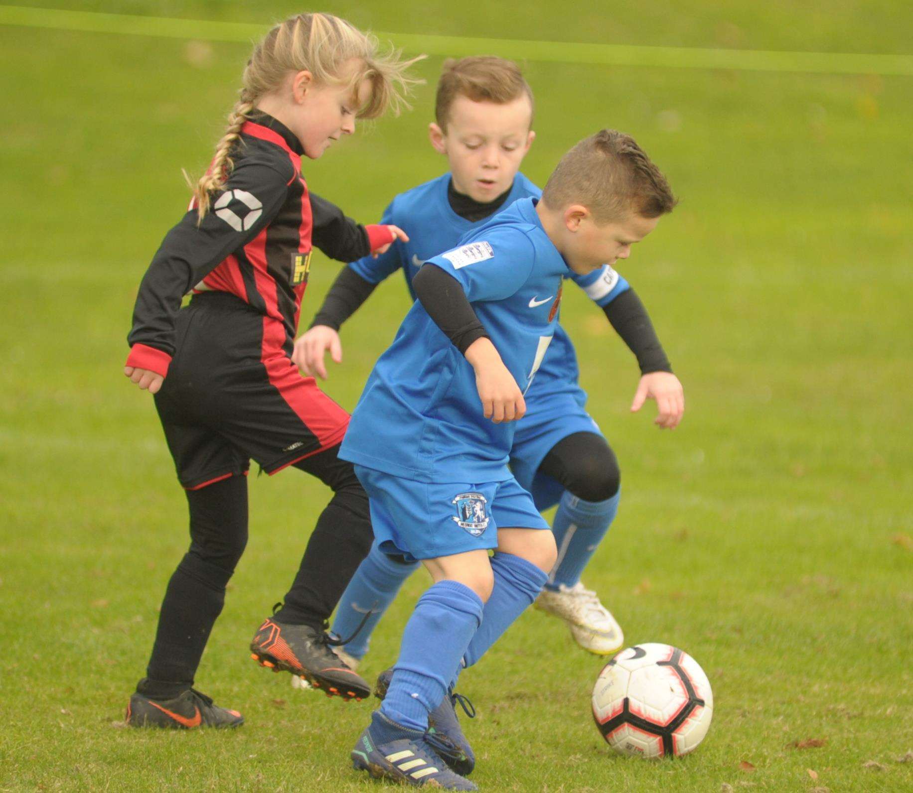 Under-8 sides Medway United West and Woodcoombe Youth battle it out Picture: Steve Crispe