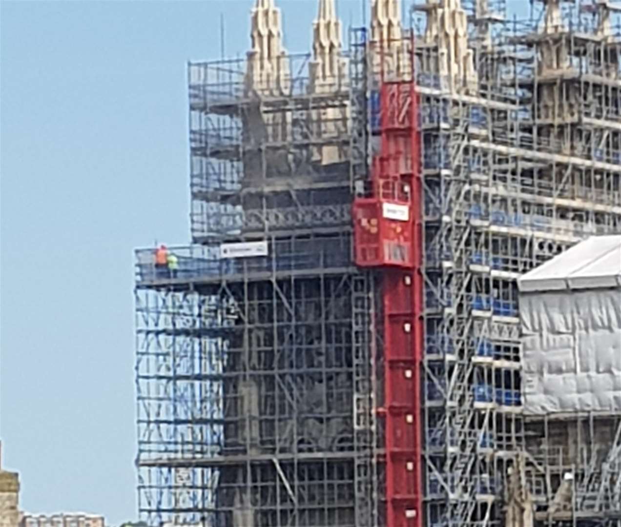 A woman climbed the scaffolding at Canterbury Cathedral