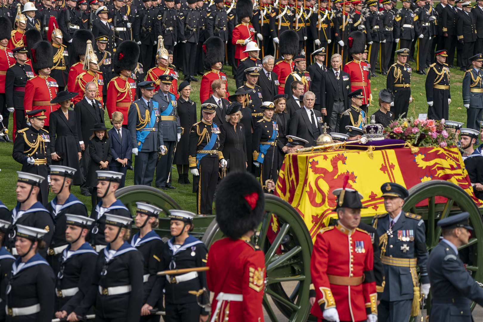 The Princess of Wales, Princess Charlotte, Prince George, King Charles III, the Duke of Sussex, the Queen Consort,the Duchess of Sussex, the Princess Royal, Princess Beatrice, Peter Phillips, the Duke of York, the Earl of Wessex and the Countess of Wessex look on as the State Gun Carriage carrying the coffin of Queen Elizabeth II arrives at Wellington Arch during the Ceremonial Procession following her State Funeral at Westminster Abbey, London Picture: PA