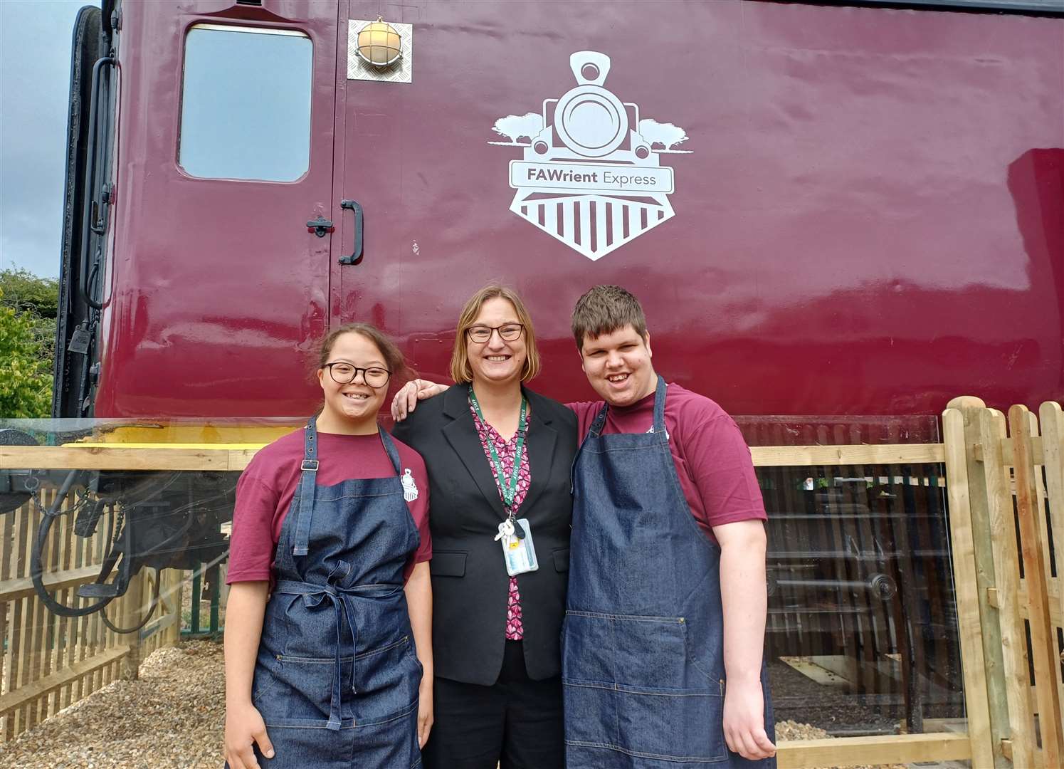 Pupils Abbie and Alfie, who are baristas in training, with Kirstie Hemingway, headteacher of the Satellites site at Five Acre Wood