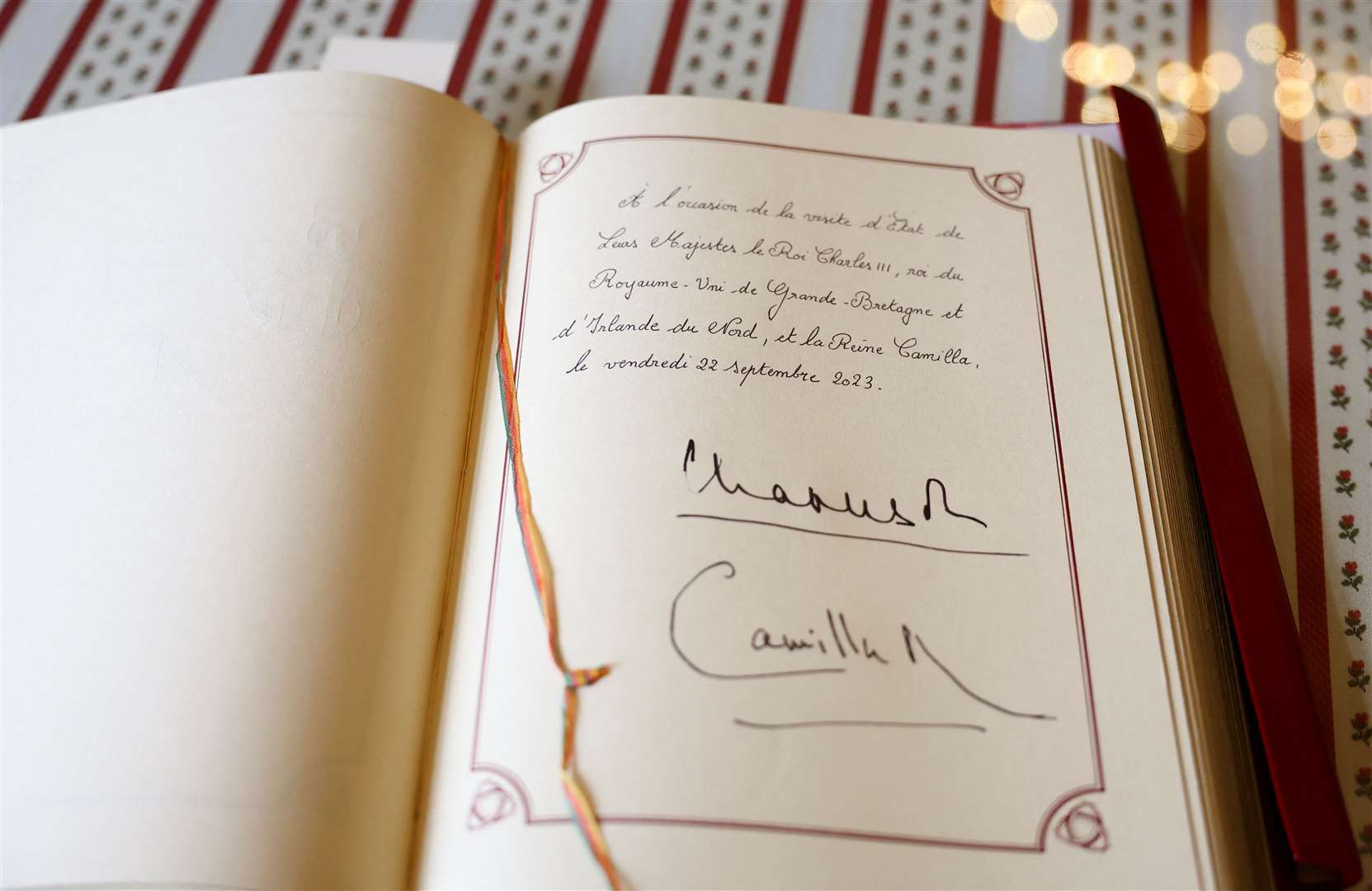 The guest book signed by Charles and Camilla (Hannah McKay/PA)