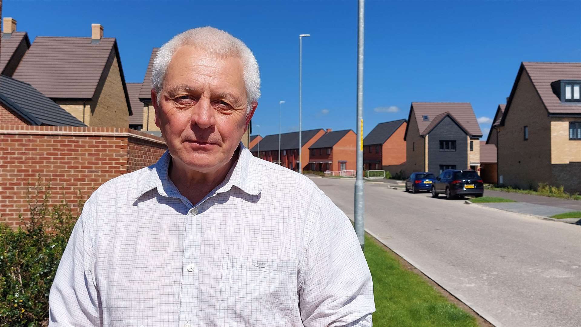 KCC is consulting on plans to close Finn Farm Road from the junction with Brockmans Lane and Rutledge Avenue. Ashford Independents councillor Ray McGeever is pictured standing in Heritage Lane, where traffic will be diverted through