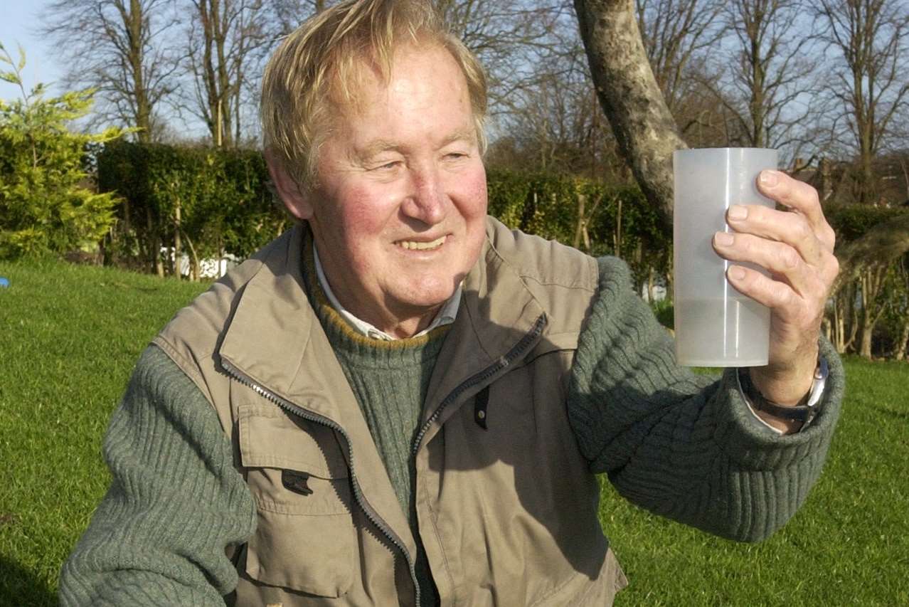 Peter Gay checks the rainfall