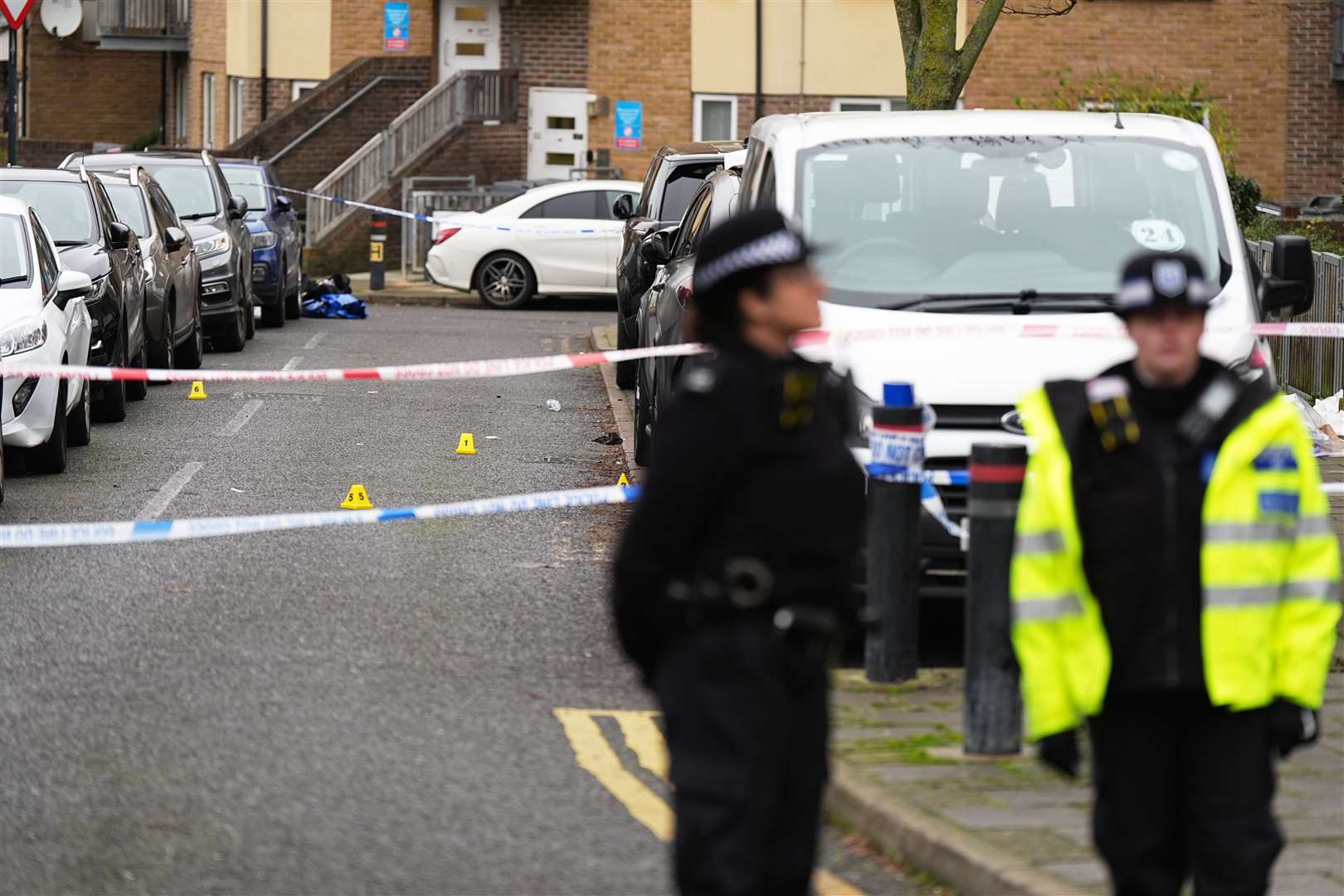 Police officers at the scene on Gifford Road (Aaron Chown/PA)