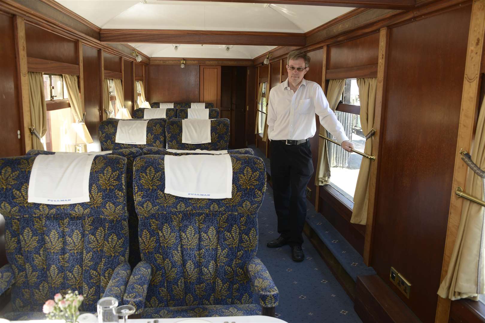 Kent and East Sussex Railway commercial manager Andre Freeman standing next to Theodora. Picture: Paul Amos