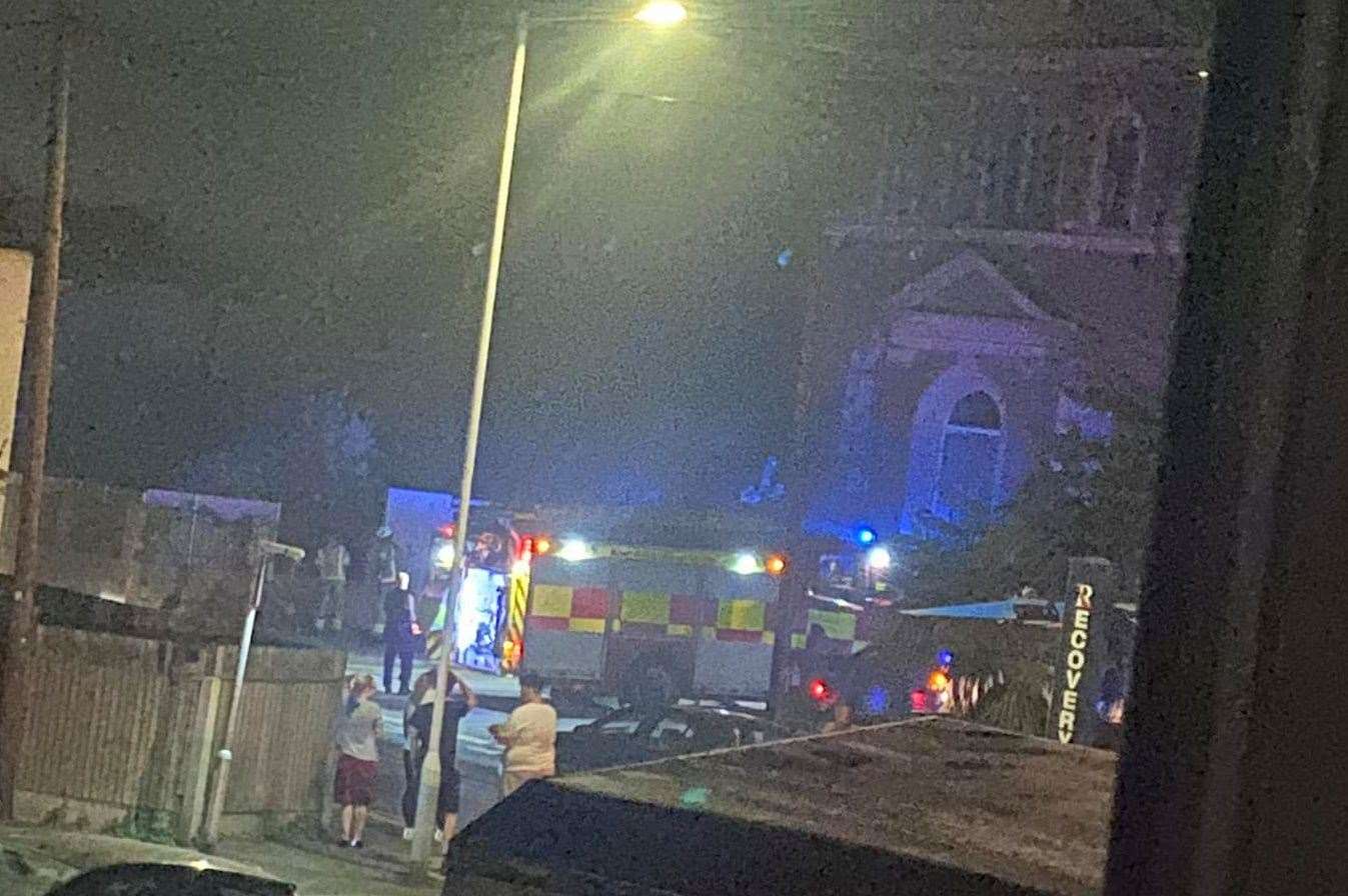 Firefighters in Trinity Road, Sheerness after a blaze in the old county library. Picture: Diana Louise Austin