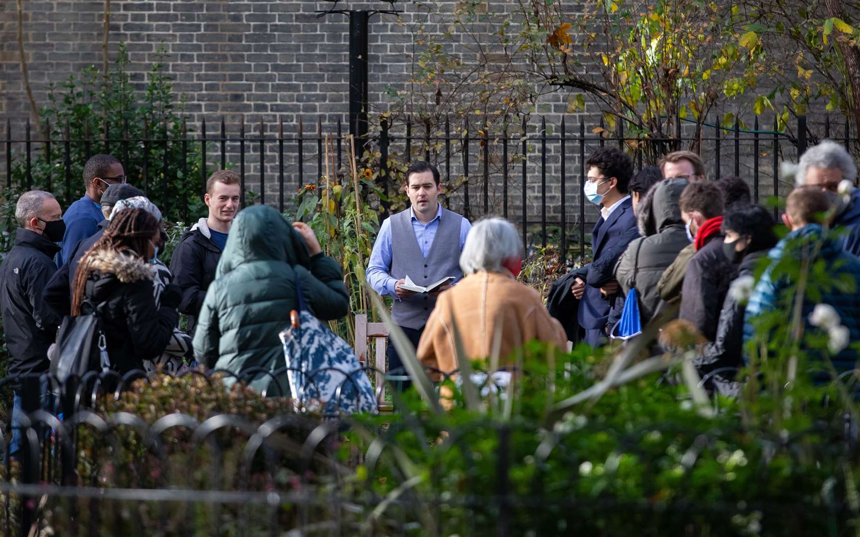 Pastor Regan King holds a service outside the Angel Church (Aaron Chown/PA)