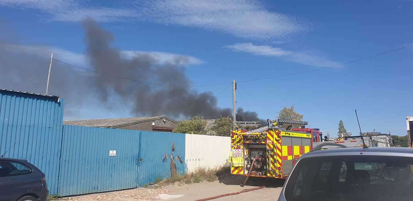 Smoke can be seen coming from the roof of the factory in Rushenden Road, Rushenden. Picture: Adam Mills