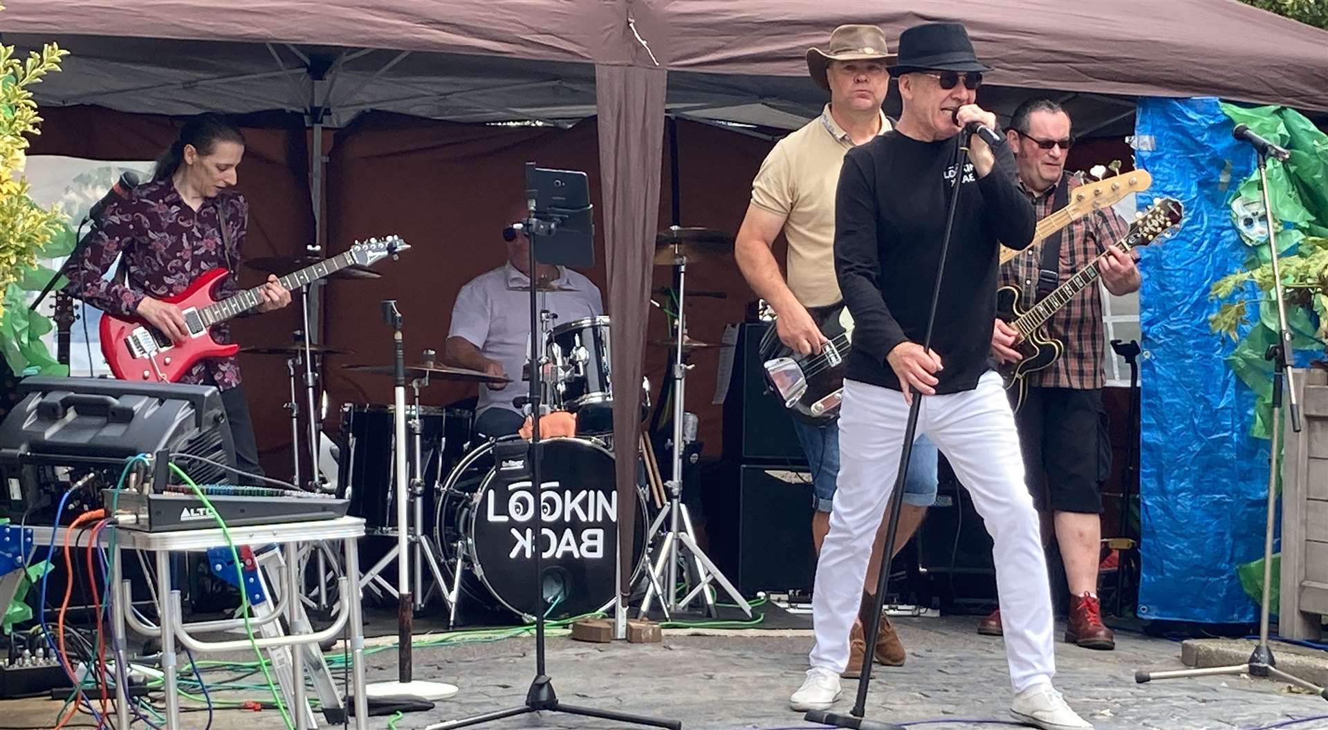 Lookin' Back perform on the "pet shop stage" in Sheerness town centre. Picture: John Nurden