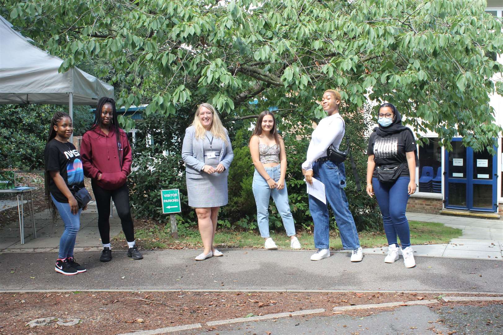 Pupils at Wilmington Grammar School for Girls join head teacher Michelle Lawson on GCSE results day