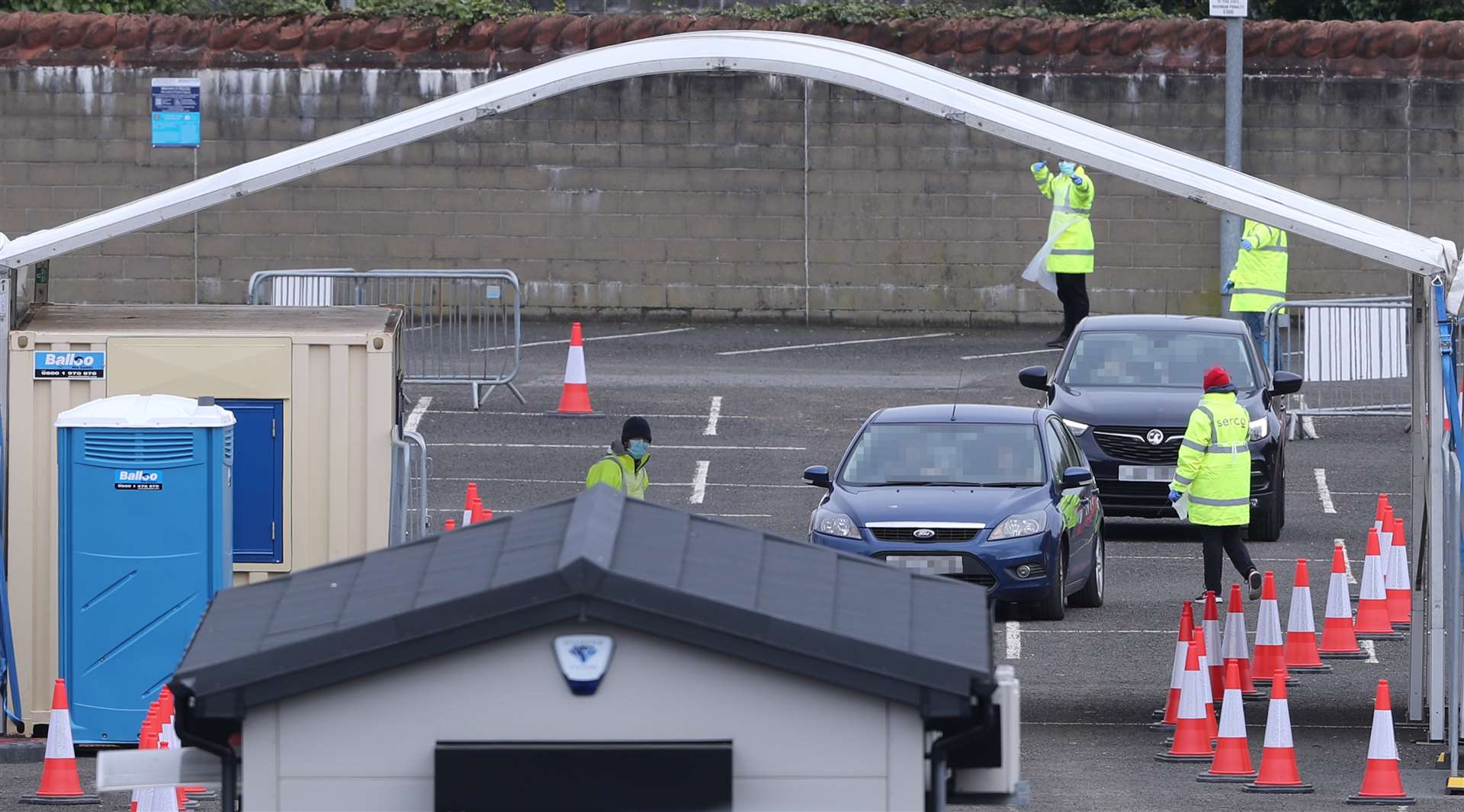 A drive-through Covid-19 testing centre in the car park of the Belfast SSE Arena (Niall Carson/PA)