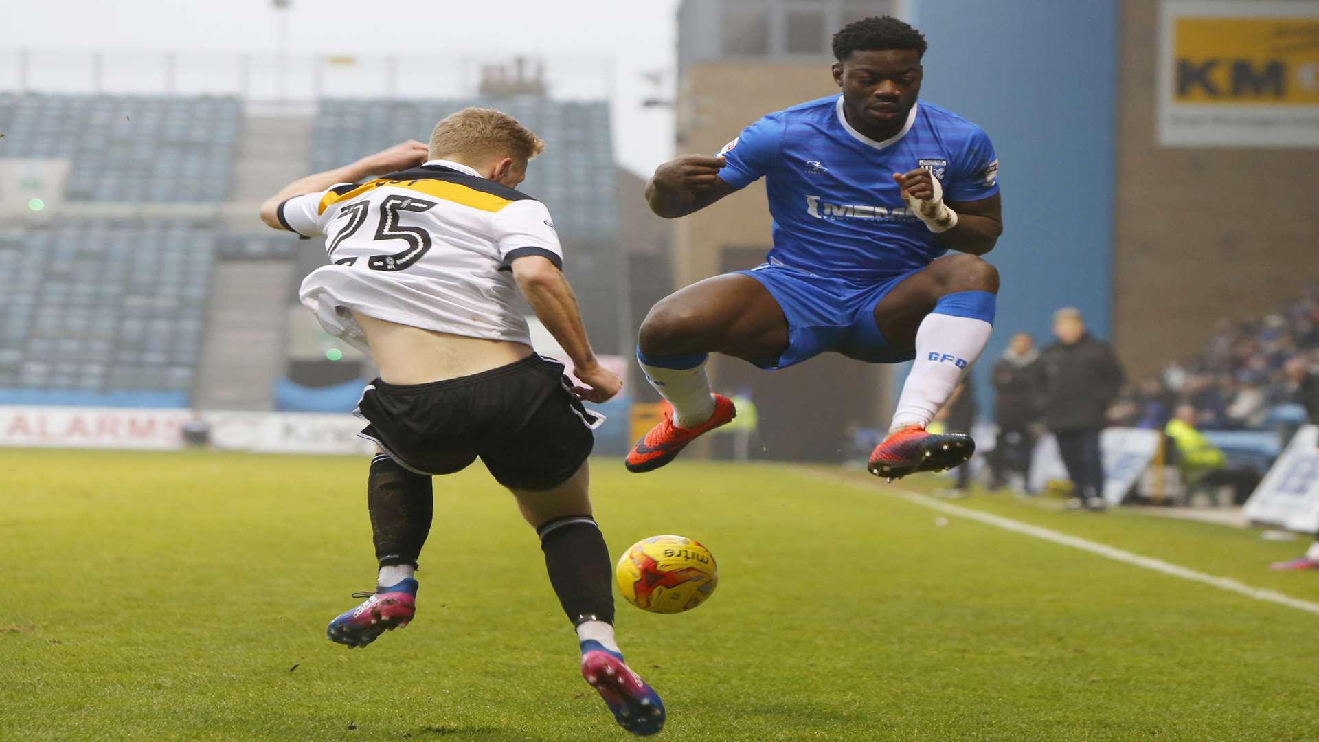 Deji Oshilaja attempts to block a Port Vale clearance Picture: Andy Jones