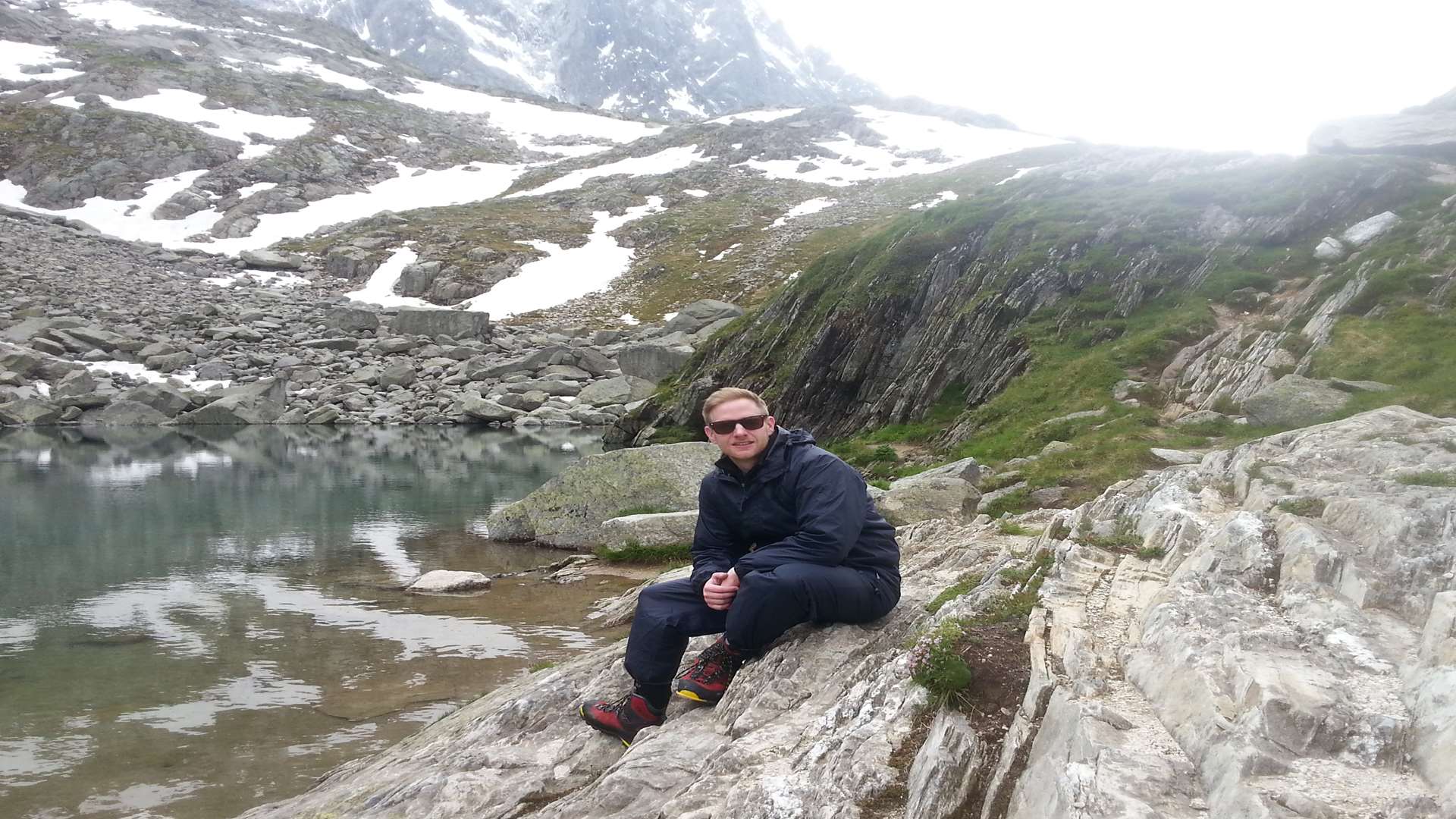 A mirror-like pool of lake in the Mont Blanc massif